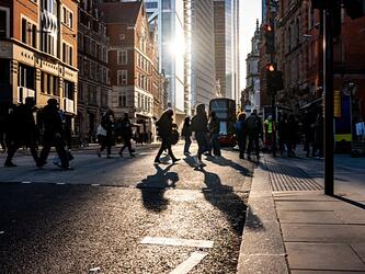people crossing street in london